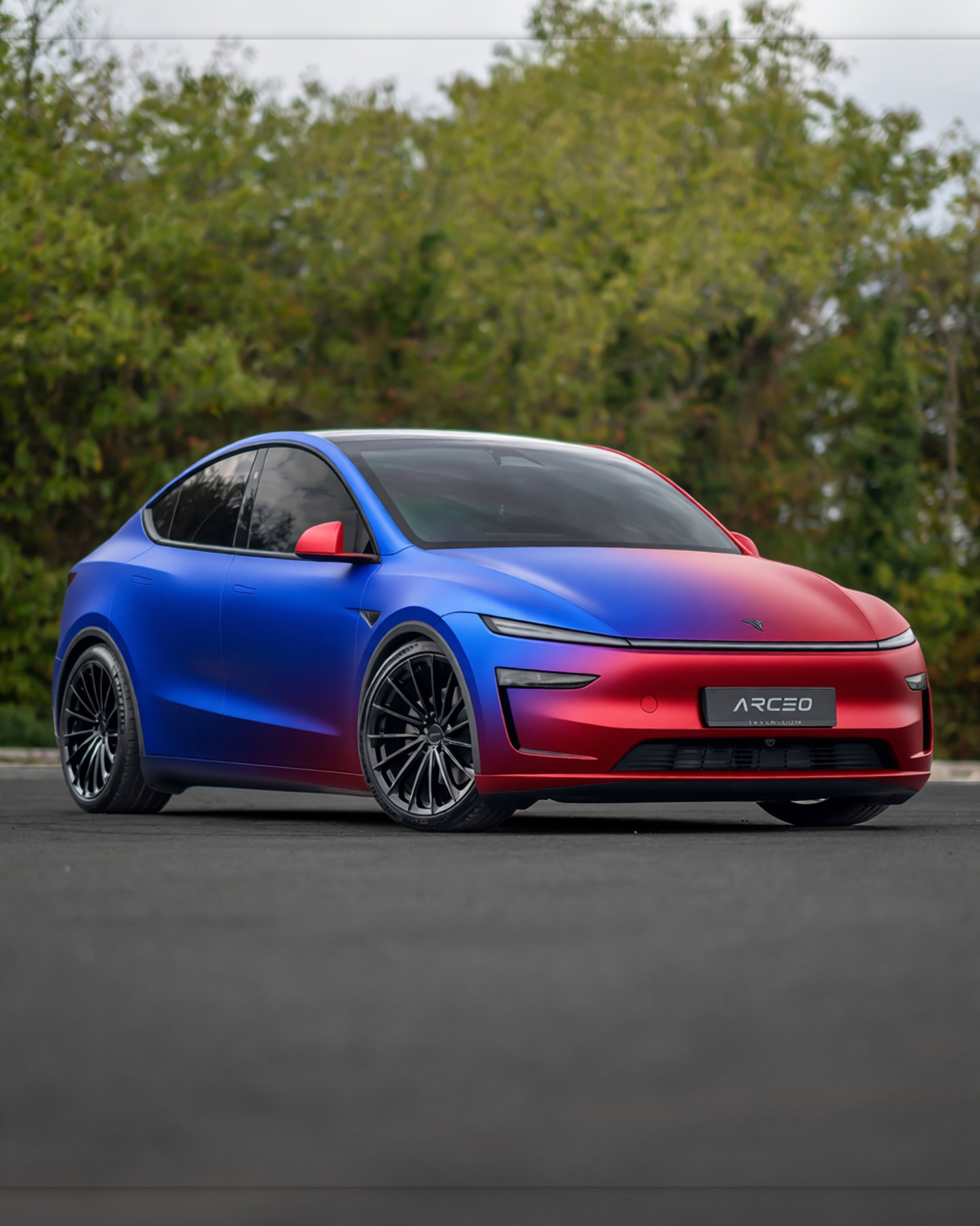 Tesla Model Y rendered in Satin ColorFlow Roaring Thunder Blue/Red gloss wrap