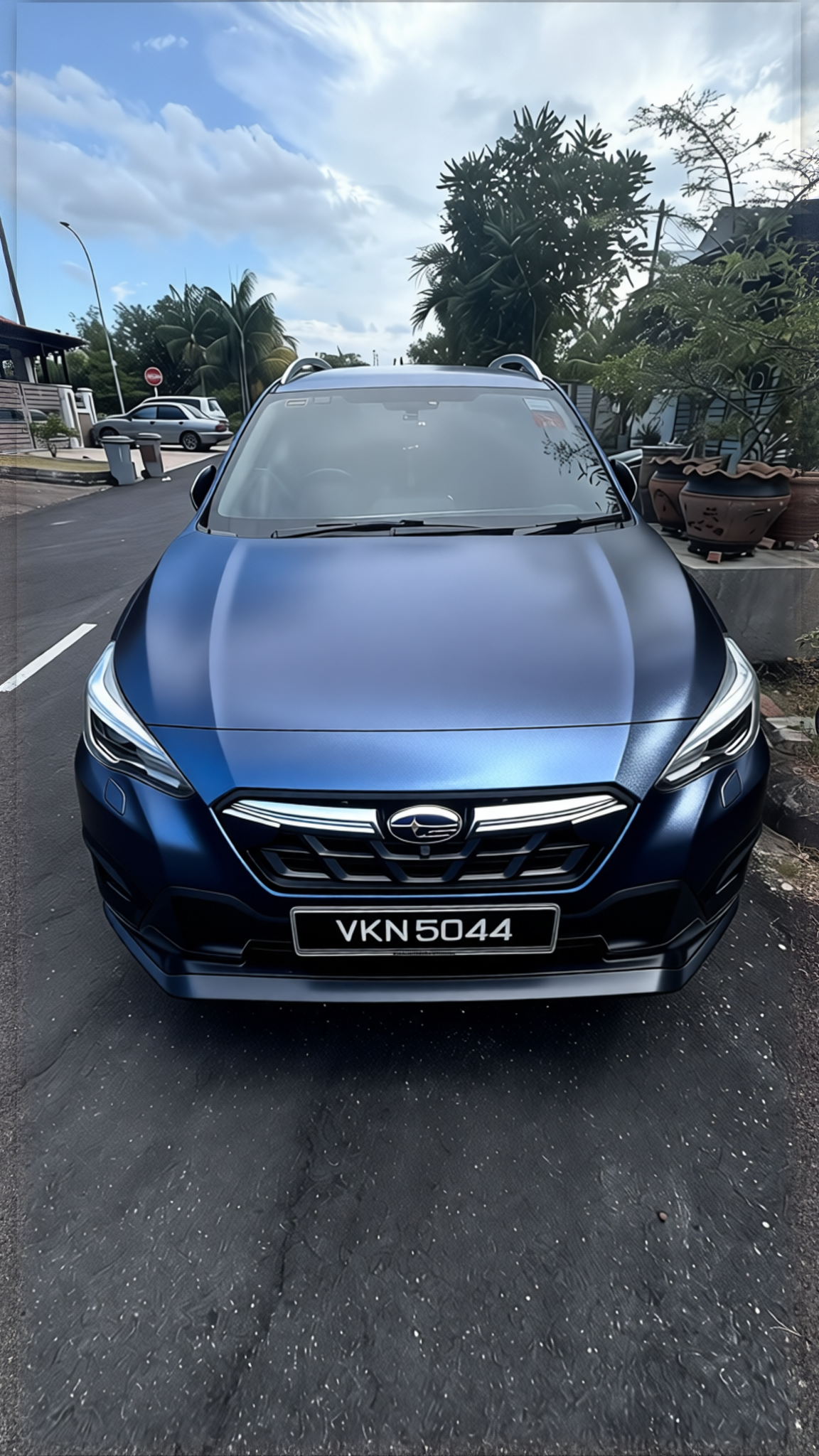 Your car rendered in Frozen Satin Metallic Charcoal Blue gloss wrap