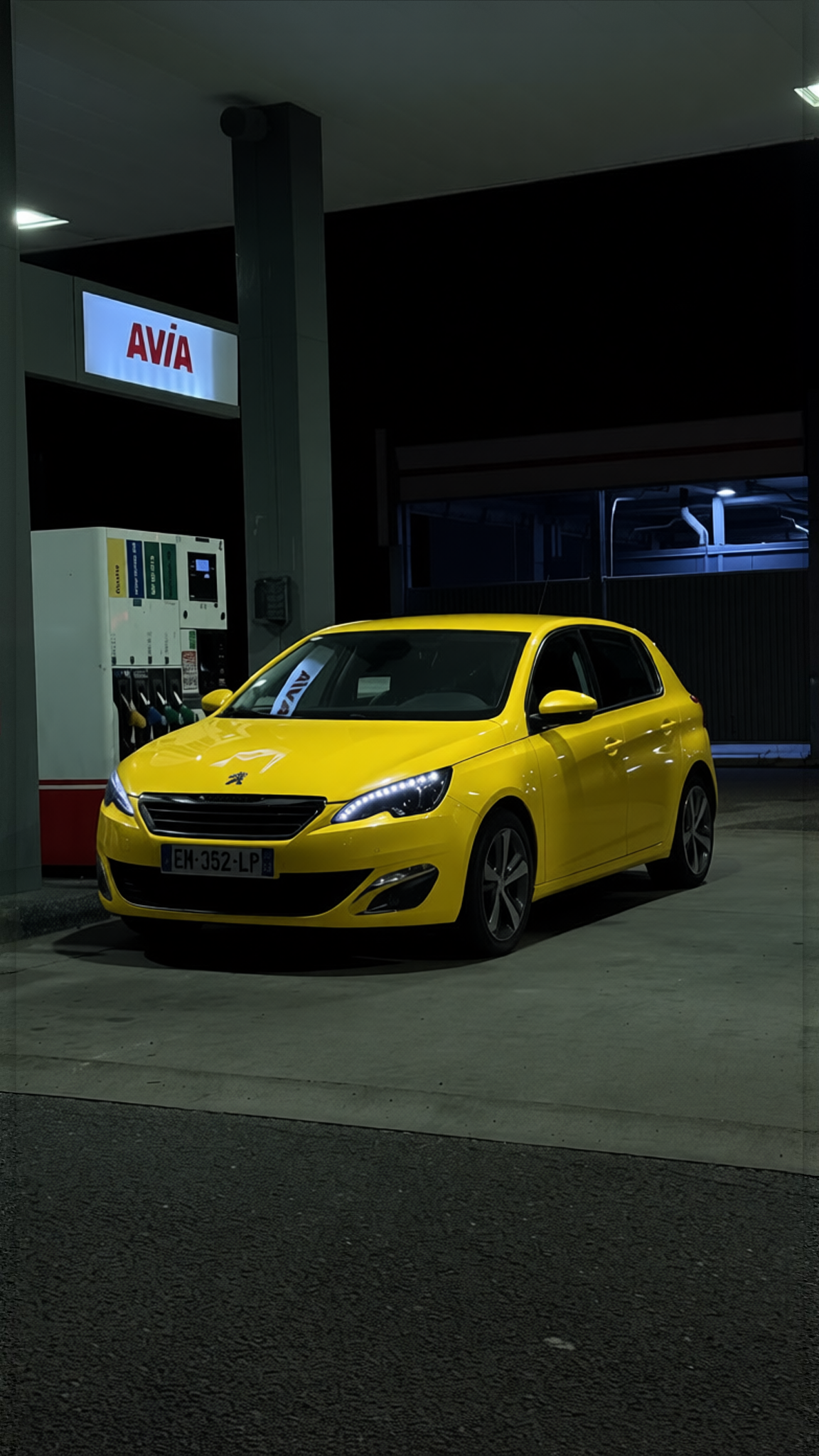 Peugeot 308 rendered in Racing Yellow gloss paint