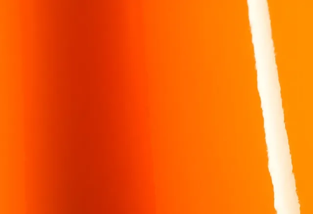Avery Dennison Gloss Orange vinyl wrap film texture · Specced